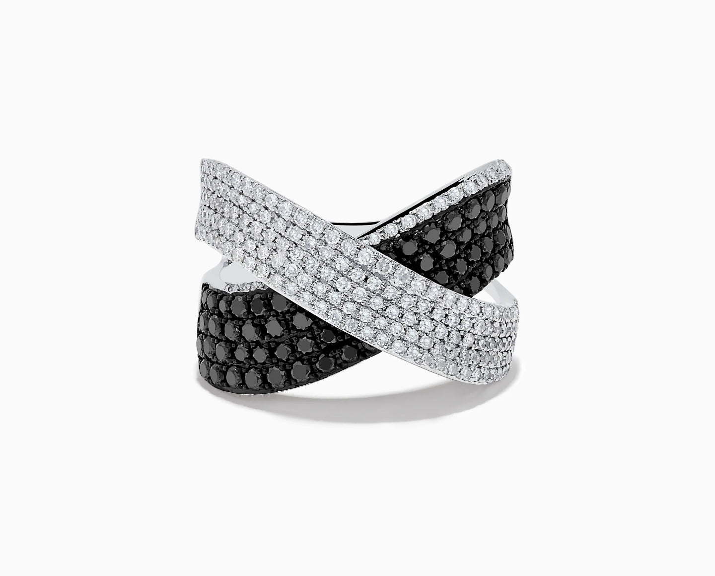 A silver crisscross ring featuring one band encrusted with small white diamonds and another band set with black gemstones, set against a white background.