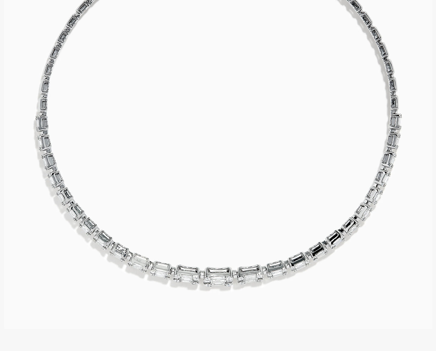 A silver necklace featuring a continuous row of rectangular, clear gemstones set closely together, displayed against a white background.